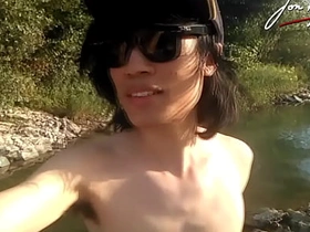 Jon Arteen is this slim Asian twink boy dancing a musical strip-tease on the river smiling showing his full pubes doing outdoor gay porn alongside a sneaker and underclothes fetish asian transgender gay sex videos